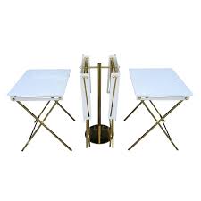 Most sets include a stand for easy storage. Set Of Four Acrylic And Brass Serving Trays With Stand By Charles Hollis Jones For Sale At 1stdibs