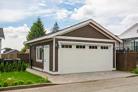 Metal garage doors block strong winds but do little to maintain a comfortable temperature. Why Insulate A Detached Garage Danley S