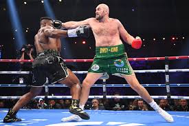 Tyson Fury wins by split decision in Francis Ngannou's debut fight - CGTN