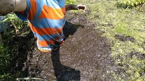 getting stuck in a muddy peat bog