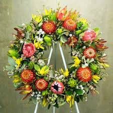 Someone has died, so their friends and family all give them something that will die too. Fresh Native Flower Tribute Wreath Flowers For Everyone
