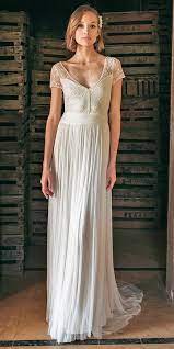27 Awesome Simple Wedding Dresses For Cute Brides Wedding Dresses Guide Womens Wedding Dresses Wedding Dresses Simple Short Sleeve Wedding Dress