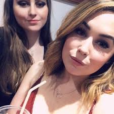 How much would a small two tier cake cost please with 2 x mini figurines of  dogs and 1x small cat