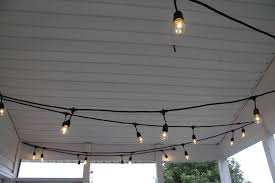 Learn how to hang outdoor string lights following these easy steps. The Easiest Way To Hang String Lights On A Screened Porch