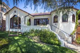 The exterior is modest with minimal. Related Image Spanish Style Homes Spanish Revival Home Spanish Bungalow