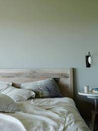 On the wall, we do see a couple of paintings that are shielded by this bedroom features that exposed brick and on that brick are very different pieces of wall art. Bloglovin