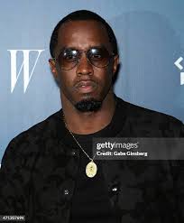 Hakkasan Group CEO Neil Moffitt and recording artist Sean "Puff... News  Photo