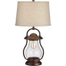 The bedside lamps are installed in this manner in many hotels, ensuring that guests have enough space for their book, mobile phone and watch on the bedside table. Franklin Iron Works Rustic Industrial Table Lamp With Nightlight Led Bronze Lantern Burlap Drum Shade For Bedroom Bedside Office Target