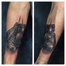 Boxing glove tattoos can be surprisingly detailed, and the realism only adds more clout to the statement. Boxing Gloves Tattoo
