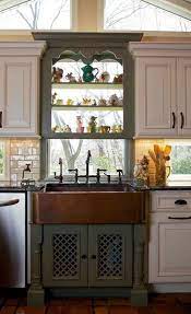 In this rustic kitchen design, the kitchen sink is cleverly hidden in the corner. Tiny House Kitchen Sink Cabinet Novocom Top