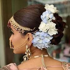 Floral Fiesta 13 Types Of Flowers For Your Bridal Hairstyle Indian Bridal Hairstyles Bridal Hair Hair Styles