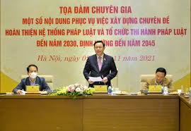 Hoàn thiện hệ thống pháp luật và tổ chức thi hành pháp luật
