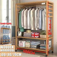 Angled frame keeps clothes from hitting the wall and provides a sturdy base so rack will not fall over. 3 Sizes Tough Durable Wooden Bamboo Garment 4 Tiers Clothes Rack Shelf Coat Shoe Storage Shelves For Home Bedroom Entryway 100 80 70cm Buy At A Low Prices On Joom E Commerce Platform