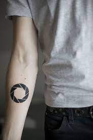 Pin By Ana Rachelle On Random Likes Gaming Tattoo Video Game Tattoos Aperture Tattoo