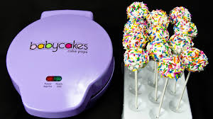 How To Make Cake Pops With Cake Pop Maker Making Cake Pops With The Babycakes Cake Pop Maker By Cookies Cupcakes And Cardio Cake Pop Maker Babycakes Cake Pop Maker Cake Pops How To Make
