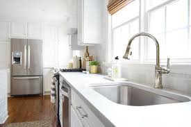 • get a bright, modern look • cabinets ship next day. Kitchen Remodel Chapter 3 The Big Reveal Young House Love Cheap Kitchen Remodel Kitchen Remodel Cost Kitchen Remodel Checklist