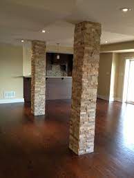 Often referred to as basement poles, lally columns or jack posts, these below grade structural supports often present a challenge when designing a floor plan. Basement Pole Column Covers Basement Ideas Basement Remodeling Diy Basement Finishing Basement