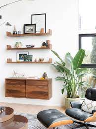 On the walls and ceilings of a room or house. How To Decorate A Large Blank Wall Hgtv