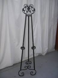 Easel Wrought Iron 1 7m 796 45 00 Party Hire Weddings Jukeboxes Marquees Party Supplies Decorations Ch Wrought Iron Easel Wrought Iron Easel