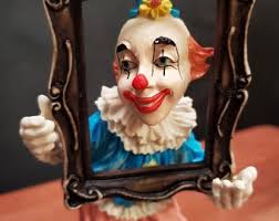 Vintage Clown Holding a Picture Figurine Sold at Kmart