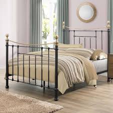 This victorian brass bed style frame has a vintage iron look perfect for any bedroom furniture style. Happy Beds Bronte5 King Size Black Finished With Antique Brass Finials Metal Bed Frame Buy Online In El Salvador At Elsalvador Desertcart Com Productid 131822437