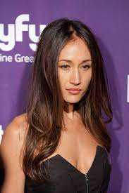 Maggie's brown hair is radiant with this wavy haircut. Q Hair Maggie Q Hairstyle