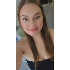 Are there tattoo artists in Kelowna who do scar cover-up tattoos and what  are their hourly rates?