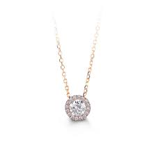 Due to the unique and natural origin of pearls, slight variations in overtone and quality may occur. 10k Rose Gold Cubic Zirconia Halo Necklace