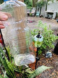 Diy Tiki Torch Fuel Using Vegetable Oil Bug Repelling Essential Oils Tiki Torches Diy Tiki Torches Diy Citronella Torch