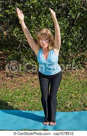 Maybe you would like to learn more about one of these? Mature Woman Yoga Chair Pose Beautiful Sixty Year Old Woman Doing The Chair Pose In Yoga Outdoors In A Natural Setting Canstock