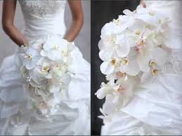 White orchid, pampas grass, ranunculus and rose were all included in this monochromatic wedding bouquet. Orchids White Bouquet Set Of Pictures Orchids White Bouquet Romance Youtube