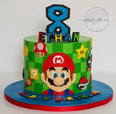 At the end of the game the winner's stars form into a large star causing the cake to light. Celebrate With Cake Super Mario Single Tier Cake Mario Birthday Cake Mario Bros Cake Super Mario Cake
