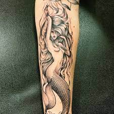 Naked mermaid tattoo