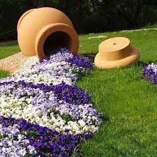 Tilted flower pots, also known as welcome pots, are great statement pieces around entry ways and gardens. Large Tilted Flower Pots How To Plant Flowers In Pots Inner Jogging