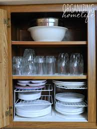 Organizing Dishes How To Organize Your Kitchen Frugally Day 6 Organizing Homelife Kitchen Cupboard Organization Cupboards Organization Kitchen Organization