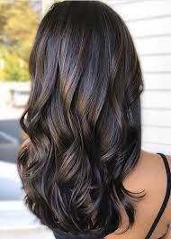 The hair is simply worn down. Dark Long Balayage Hairstyle Long Hair Trends Hair Styles Ombre Hair Color