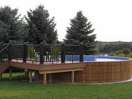 Above ground pool with connecting deck with the house. Above Ground Pool Decks Crestwood Pools
