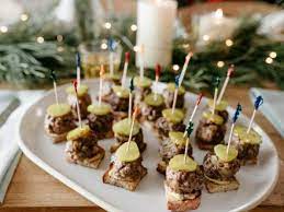 Choose from classic snacks like spiced nuts, cheese balls, easy dips and spreads, meatballs, shrimp cocktails, sausage balls, and more. 90 Easy Holiday Appetizers Holiday Recipes Menus Desserts Party Ideas From Food Network Food Network