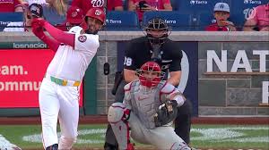 Derek Hill hitting a home run