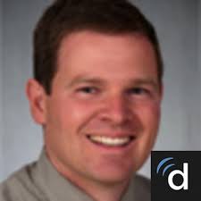 Dr. Christopher B. Wheelock, MD