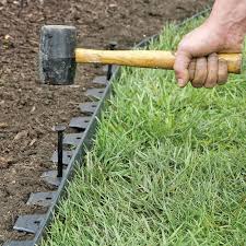 The spikes easily pierce through the fabric and help secure the barrier. No Dig Garden Edging Easyflex Landscaping Edging Free Shipping