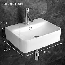 Generally, all people, short and tall, should be able to at least see their heads and shoulders. 440mm Rectangular Latina Narrow Cloakroom Wall Mount Contemporary Sink