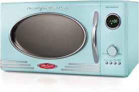 With the largest capacity in the big chill line — a massive 20.5 cu. Amazon Com Nostalgia Rmo4aq Retro Large 0 9 Cu Ft 800 Watt Countertop Microwave Oven 12 Pre Programmed Cookin Digital Clock Easy Clean Interior Aqua Kitchen Dining
