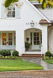 Creamy white painted brick house. 7 Cream Painted Brick Exterior Ideas Painted Brick House Colors House Exterior