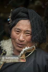 Portrait of a man wearing Tibetan ...