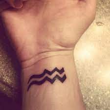 Aquarius Tattoos Inkdoneright Com Aquarius Tattoo Tattoos Wave Tattoo Wrist