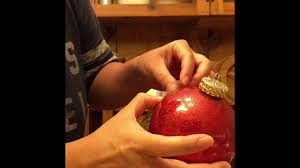 applying vinyl onto curved ornament