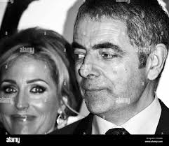 Rowan atkinson and gillian anderson hi-res stock photography and images