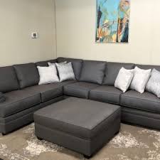 A long, narrow living room with a fireplace the style: Living Room Home Furniture Mecklenburg Home
