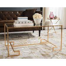 Striking and practical is this elegantly lined glass top coffee table. Safavieh Burton 42 In Antique Gold Large Rectangle Glass Coffee Table Fox2582a The Home Depot